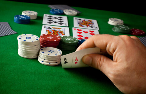Poker Poker concept with cards on green table